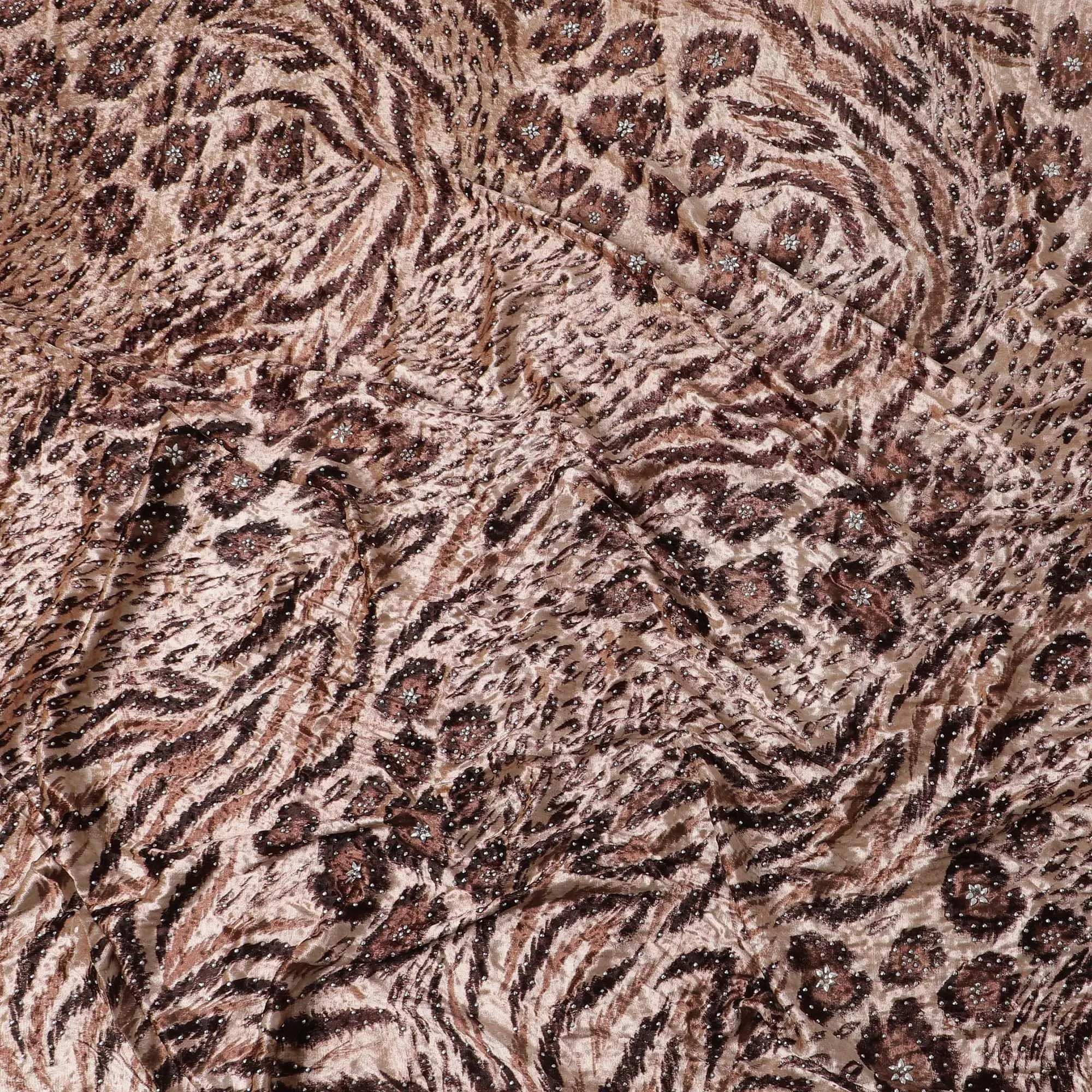 Light salmon pink Rayon velvet fabric with cocoa brown, fawn brown print having metallic silver studs in abstract design